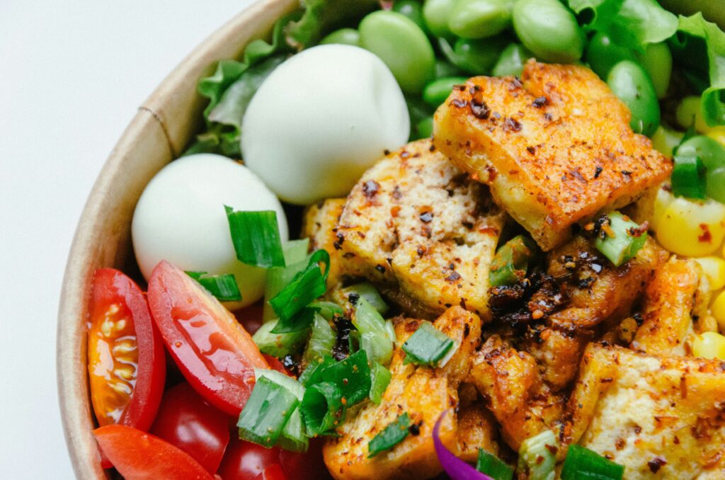 Boost Metabolism Assortment of high-protein foods including eggs, chicken, lentils (daal), and chickpeas (channa) common in Pakistani and Indian diets.