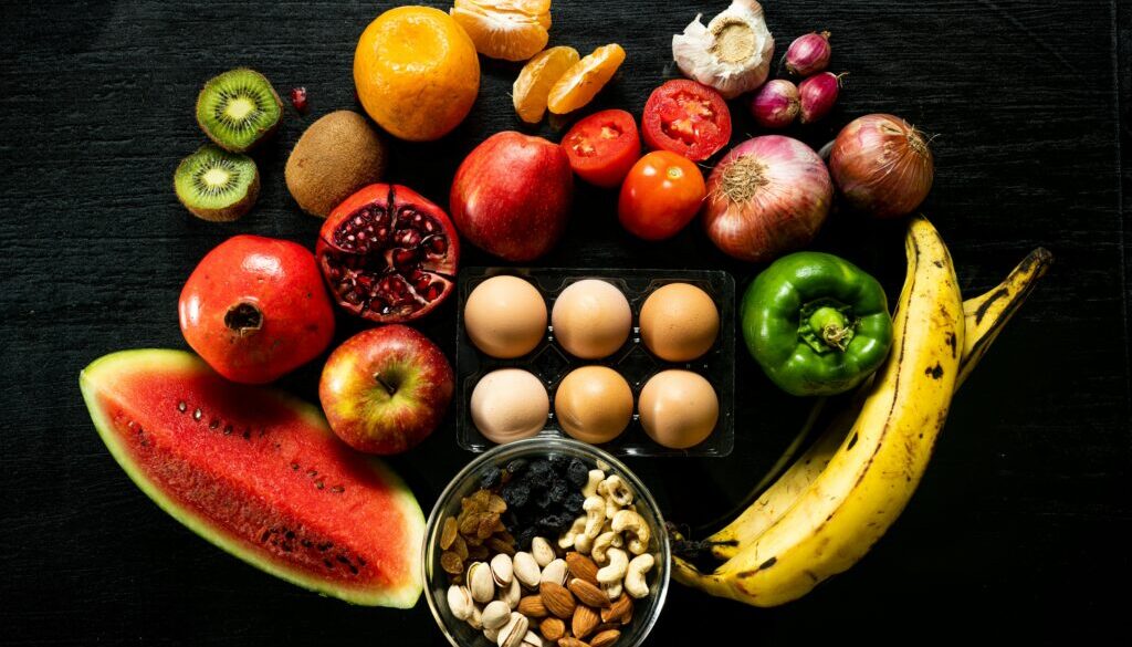 Colorful illustration comparing a slow metabolism to a fast one, showing how protein, green tea, and spices can boost calorie burn for weight loss.