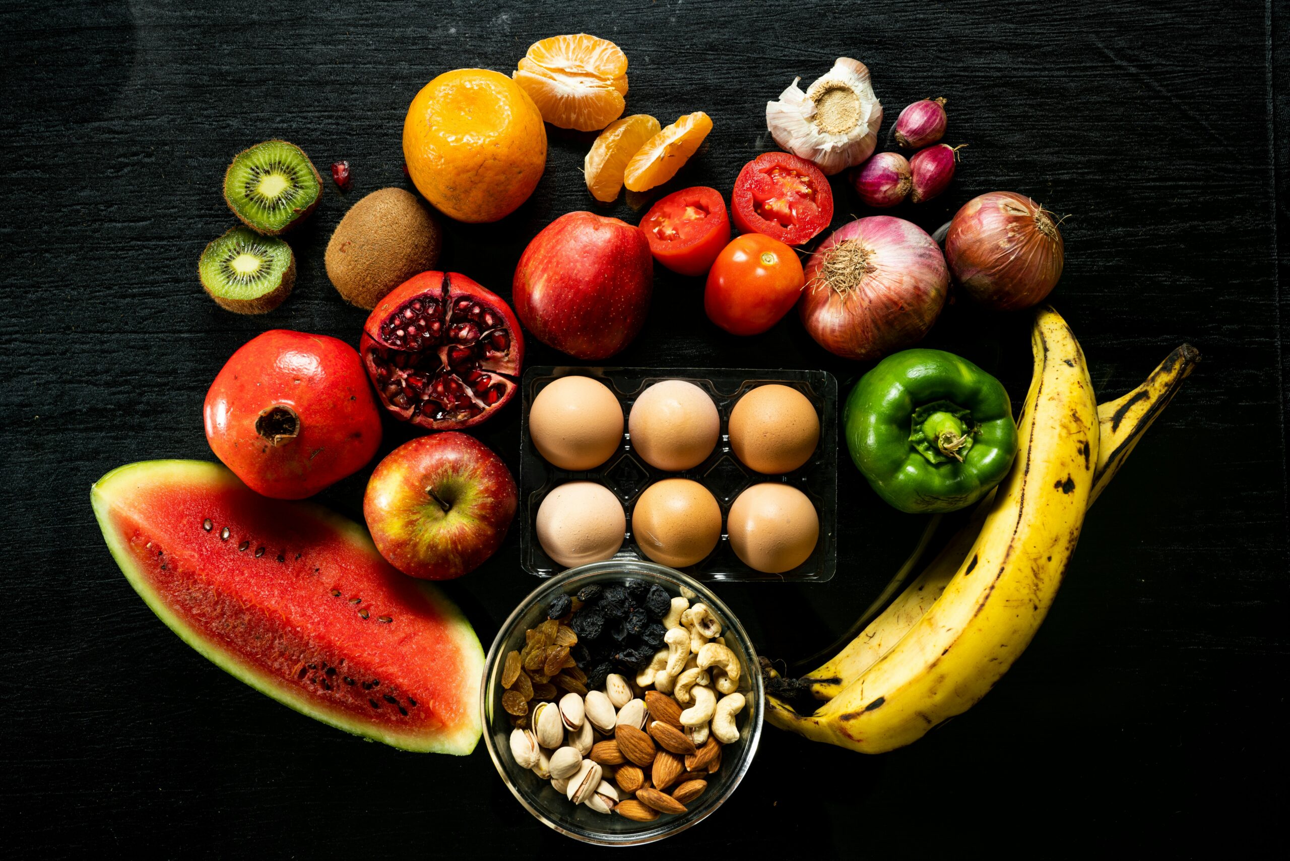 Colorful illustration comparing a slow metabolism to a fast one, showing how protein, green tea, and spices can boost calorie burn for weight loss.